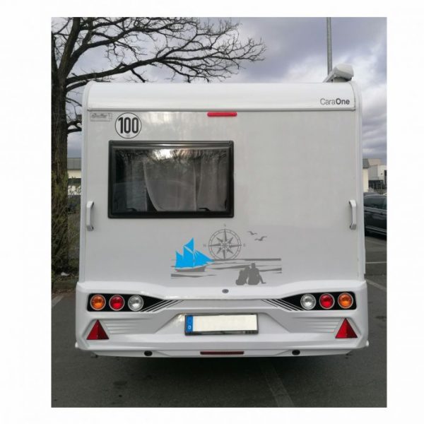 wohnmobil aufkleber paar am strand.